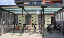 view of Trueform's DLR cycle shelter that has solar powered lighting and CCTV