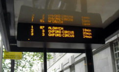 view of a matrix LED display with passenger information on screen.