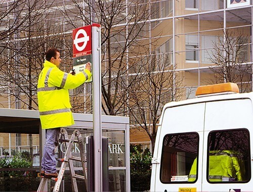 underground sign being installed by a Trueform employee.