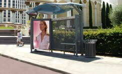 view of a digital dynamic 6 sheet display installed on a bus shelter.