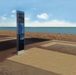 view of installed Portsmouth Legible City wayfinding totem near the sea.