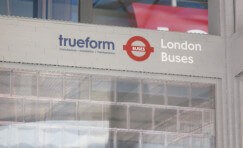 view of sign inside London LEGO bus shelter.