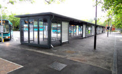view of large bus shelter at Bletchley Bus Station for multiple buses.