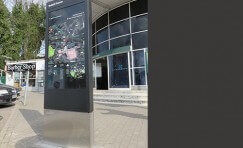 view of installed Surrey Pedestrian wayfinding fingerpost sign.
