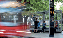 Bespoke Trueform bus shelter and wayfinding signage installed in Colmore Row, Birmingham, with integrated digital display and modern design.