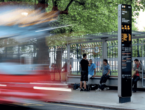 Bespoke Trueform bus shelter and wayfinding signage installed in Colmore Row, Birmingham, with integrated digital display and modern design.
