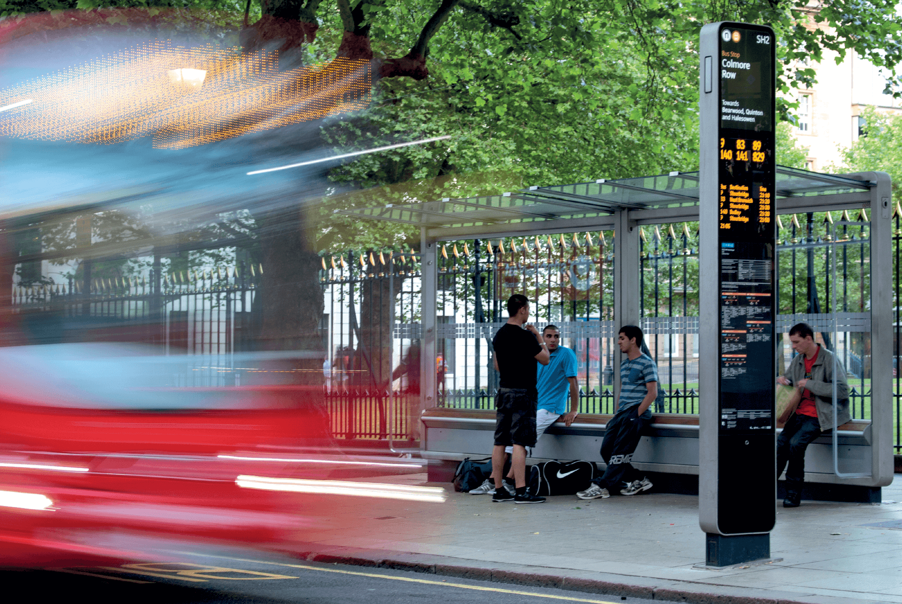 Bespoke Trueform bus shelter and wayfinding signage installed in Colmore Row, Birmingham, with integrated digital display and modern design.