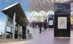 Modern rail infrastructure including shelters, signage, and digital displays at a busy station